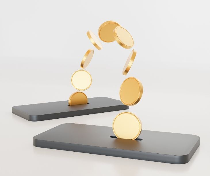 coins between two smartphones