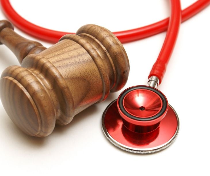 law gavel with stethoscope