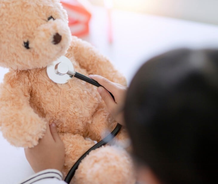 Image of a teddy bear with a stethescope. 