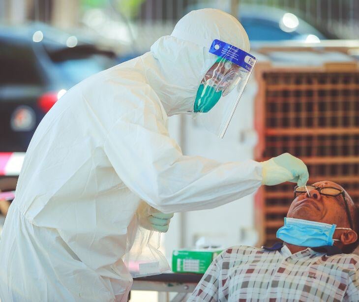 healthcare worker in protective gear for post Breaking confidentiality during public health concerns