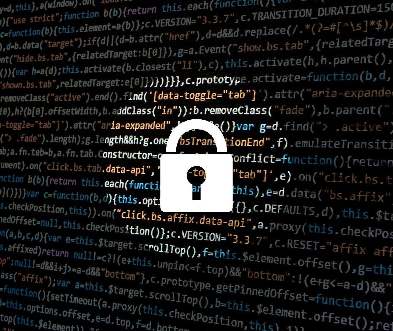 Image of lock overlapping code on a computer. 
