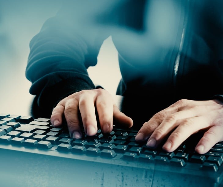 Image of someone typing on a computer. 