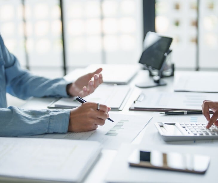 Image of two people talking. 