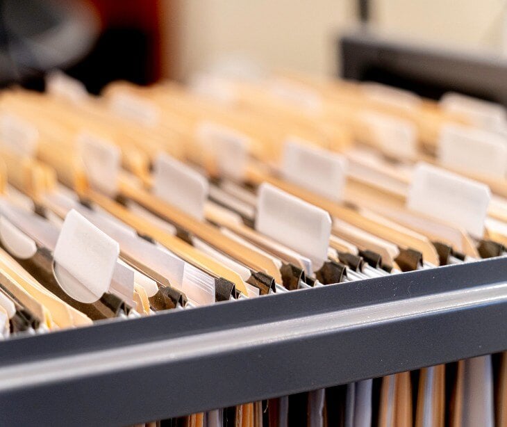 Image of files in a cabinet.