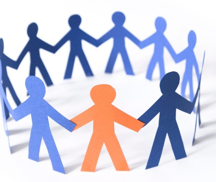Image of paper cut outs of individuals for blog about How HIPAA compliant email benefits online cancer support groups