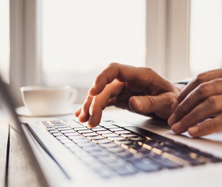 Image of someone typing.