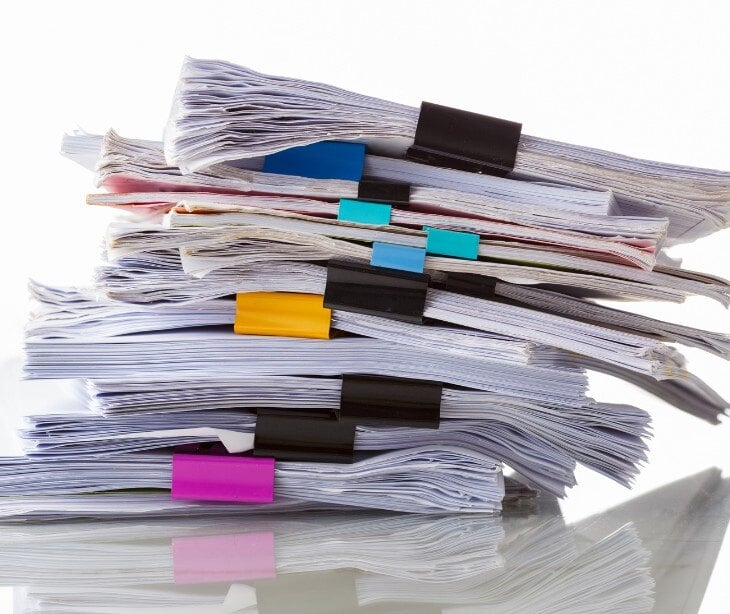 Image of stacks of paper for blog about How to handle sensitive data