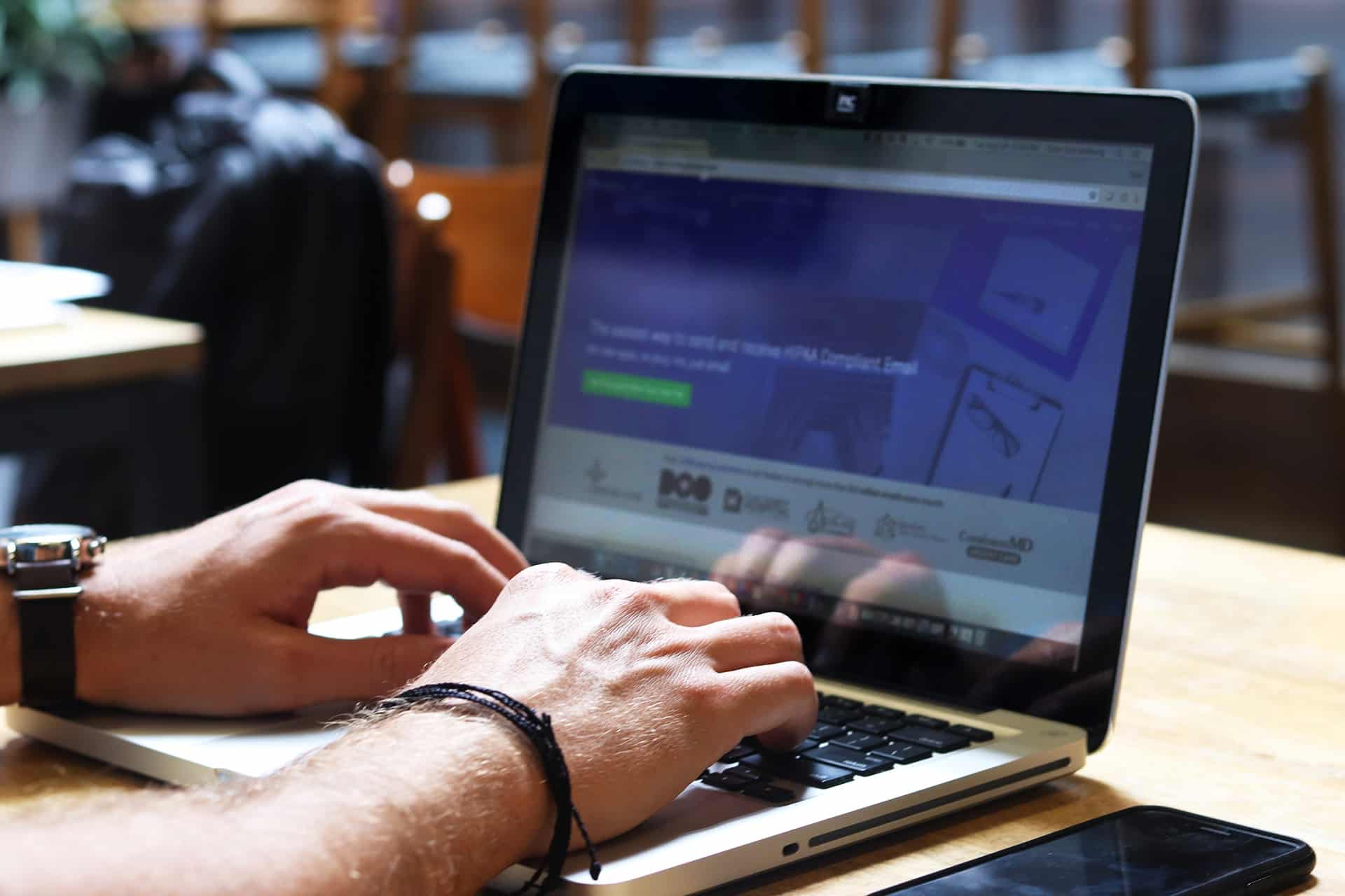 typing on laptop