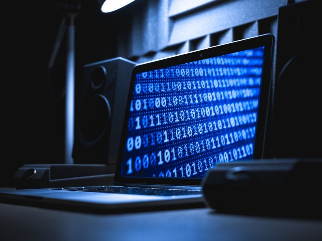computer with blue data screen