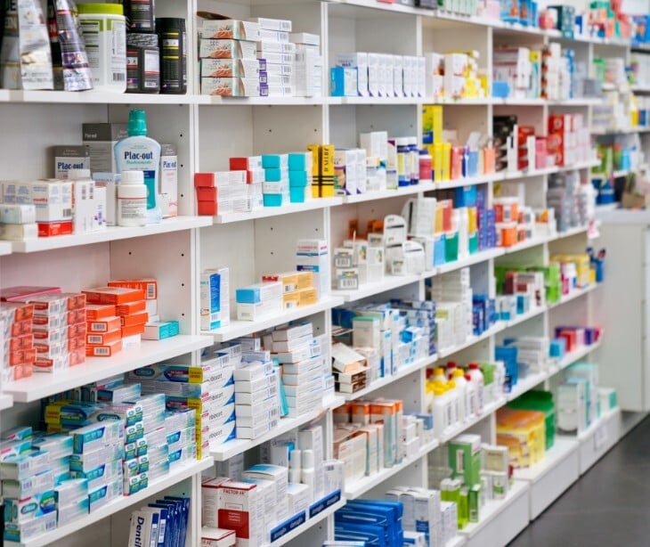 Image of a pharmacy where different prescription medicines are visible. 
