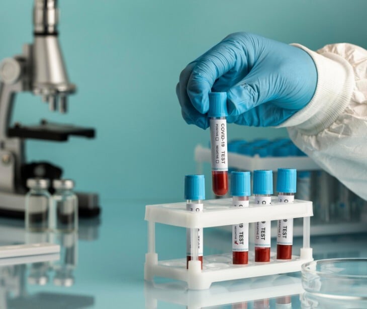 Image of a pathologist collecting samples. 