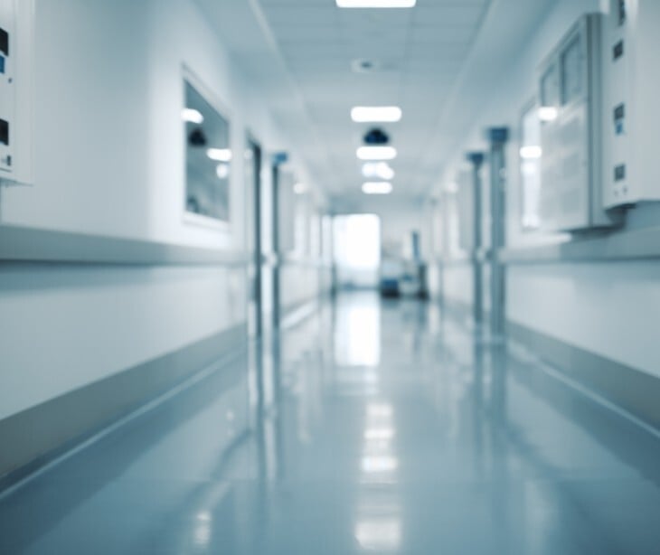 Image of the inside of a brightly lit hospital. 