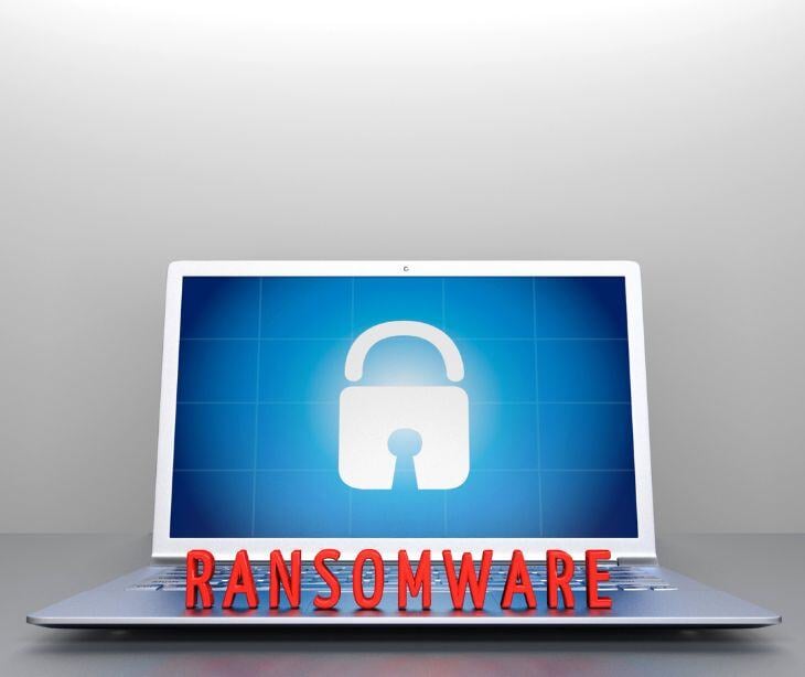 laptop with ransomware text