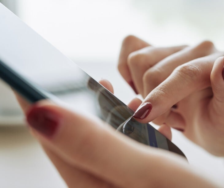 Image of someone on a smart phone. 