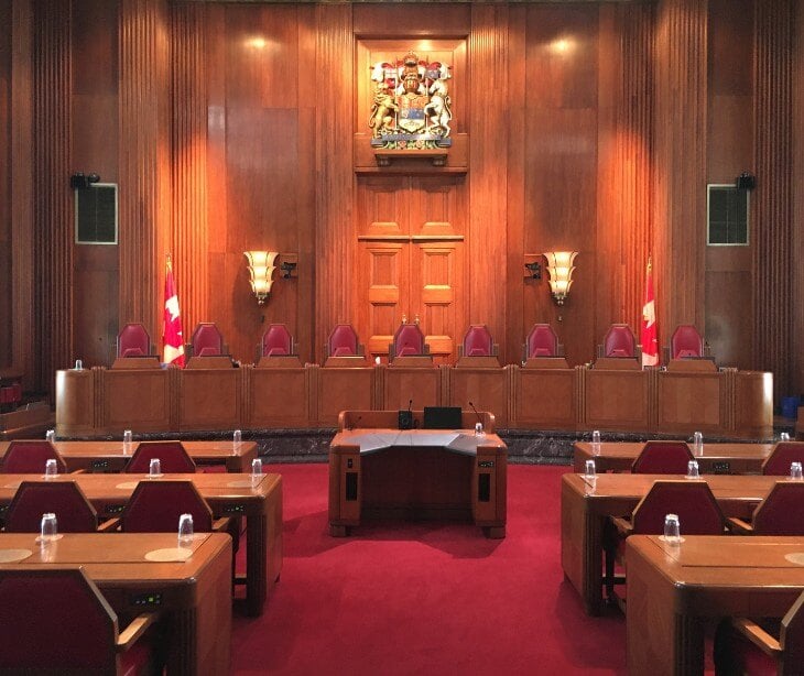 Image of an empty court room.