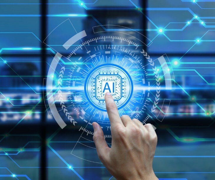 Image of someone touching a screen that says AI for blog about CISA launches AI cybersecurity collaboration playbook to strengthen AI resilience