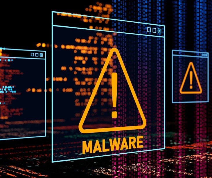 Image of triangular warning sign for blog about Malware distribution and defending yourself