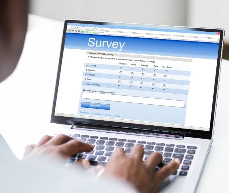 Image of someone completing a survey for blog about Creating secure online forms