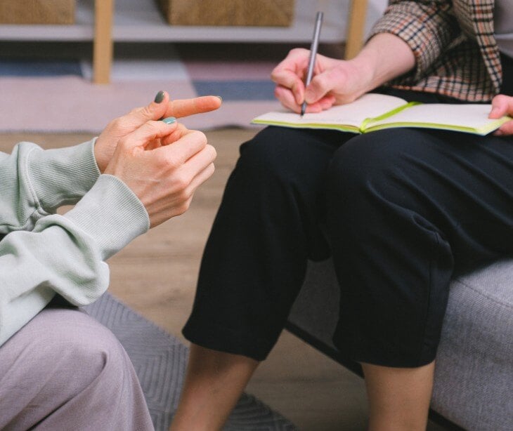 Image of two people talking for article The impact of psychiatric advance directives on informed consent