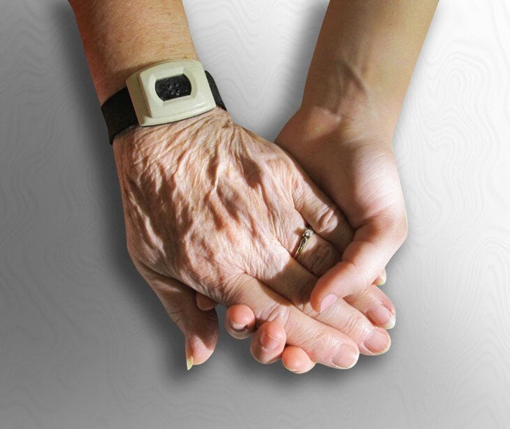 Image of two people holding hands for blog about What are medical advance directives?