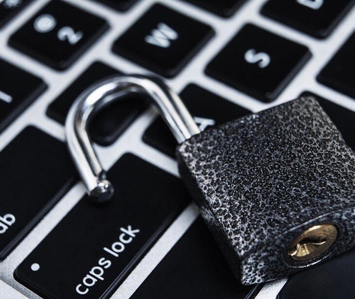 Image of a lock on a keyboard for article about Canadian authorities arrest suspected hacker linked to Snowflake data breach