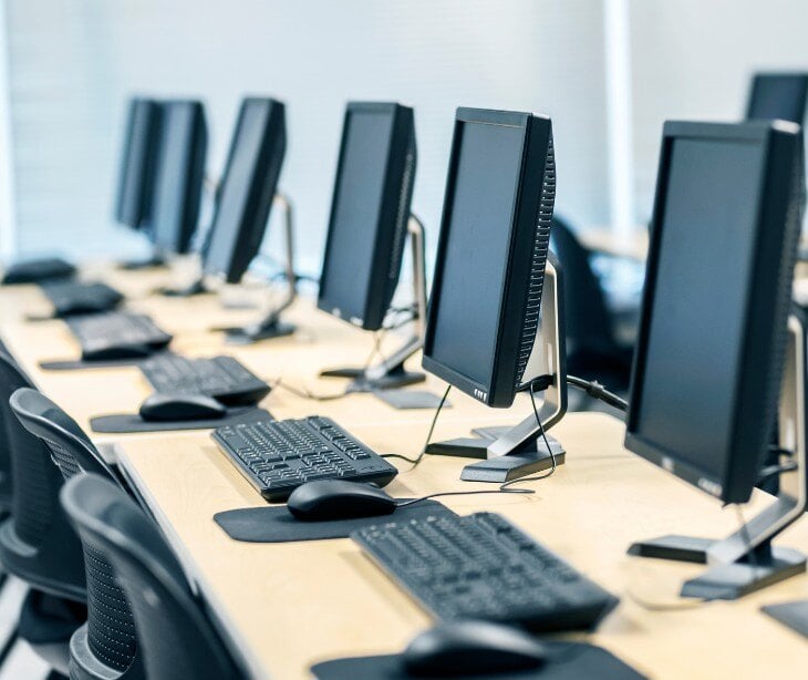 Image of multiple computers for blog about Managing HIPAA risks on shared devices