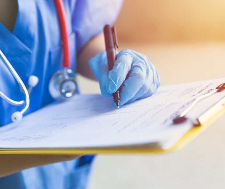 Image of nurse taking notes for blog about What is the difference between 