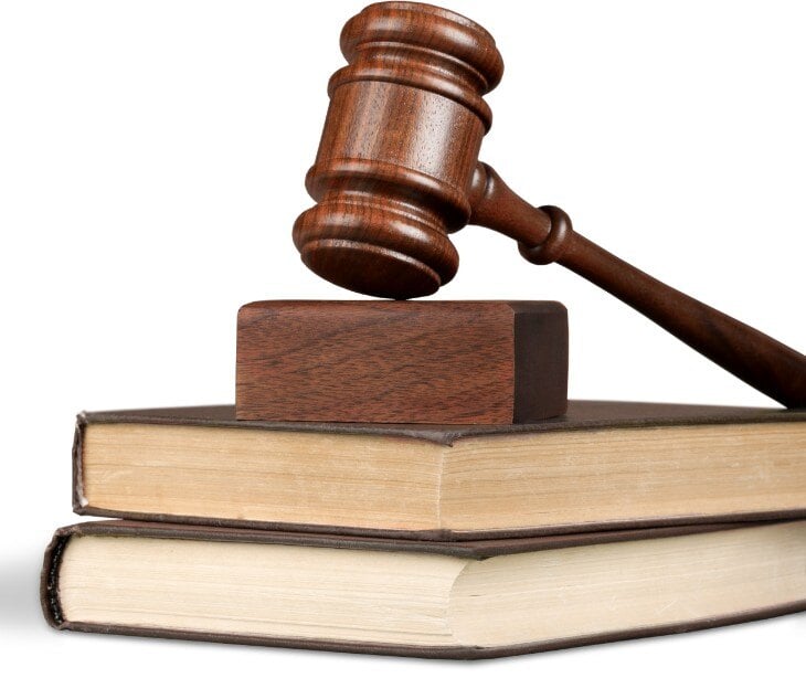 Image of gavel and book for blog about What are the “Titles” in HIPAA?