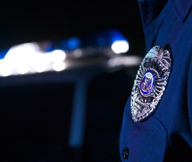 Image of police badge for blog about When does the Privacy Rule allow covered entities to disclose PHI to law enforcement? 