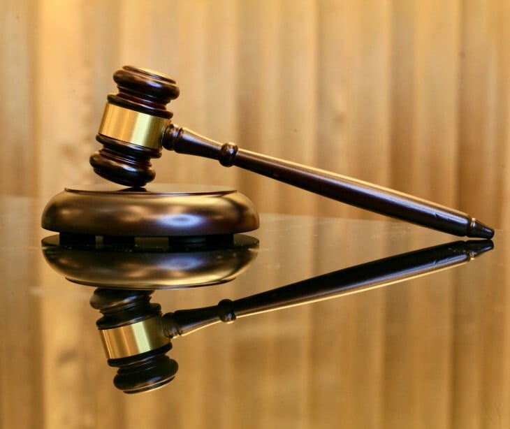Image of a gavel on a table.
