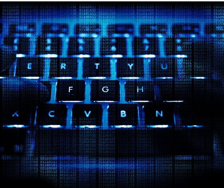 hands on dark computer keyboard