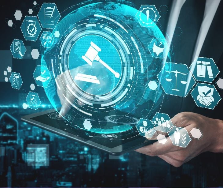 floating digital law icons over laptop