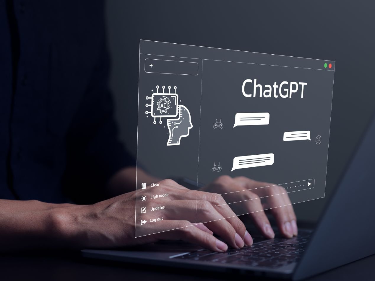 chatgpt logo floating on computer