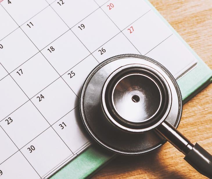 stethoscope on calendar