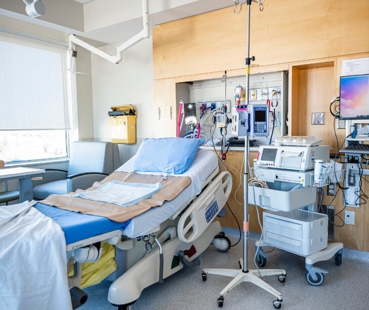 Image of a hospital room with bed. 