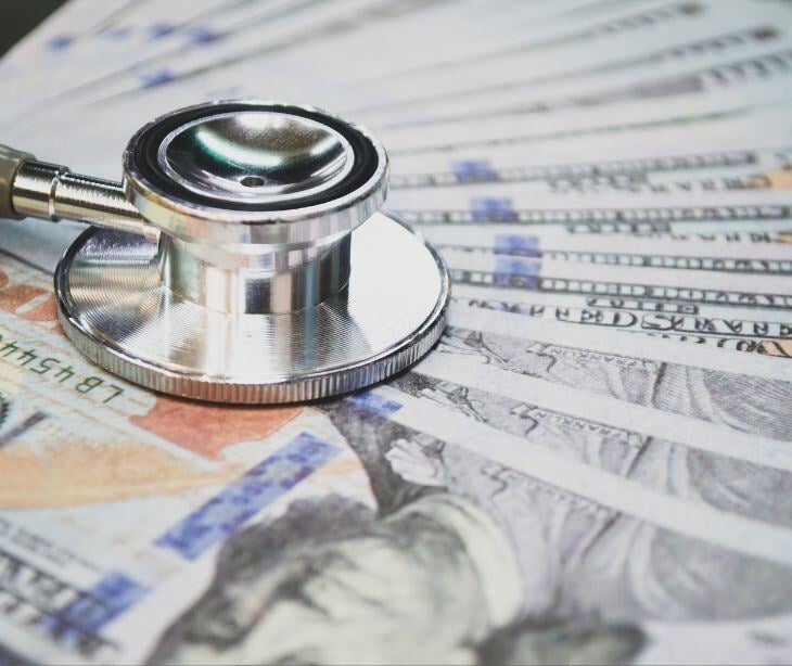 stethoscope with bills